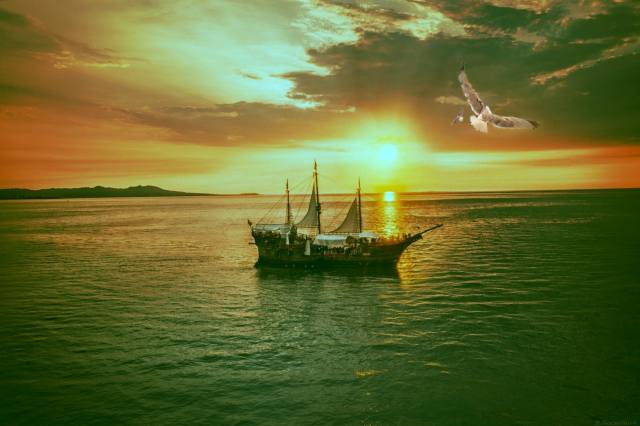 sailboat, the ocean, the sky
