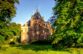 the mansion, lawn, trees, clear skies