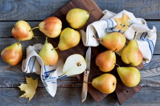 pears, maple leaf, knife, towel, cutting Board