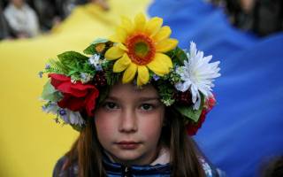Ukrainian flag, young gir, Krakow, poland